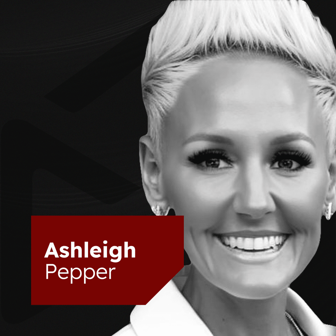 Black and white photo of a smiling woman with short, light-colored hair. She has a bright smile and is wearing a light-colored top. A red geometric graphic with her name "Ashleigh Pepper" is displayed on the left side of the image.